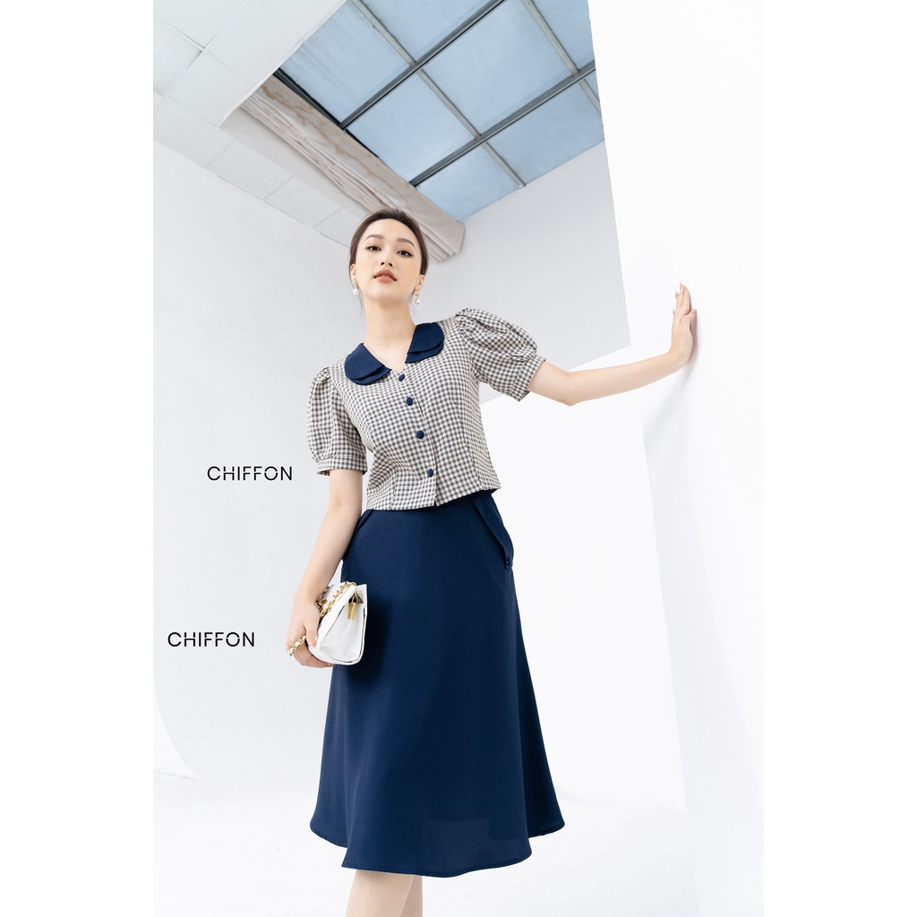 Chân váy dáng xòe nữ phối túi chéo đính cúc của set ký giả cổ sen Chiffon