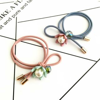 Cột tóc hoa rơi đính châu cute
