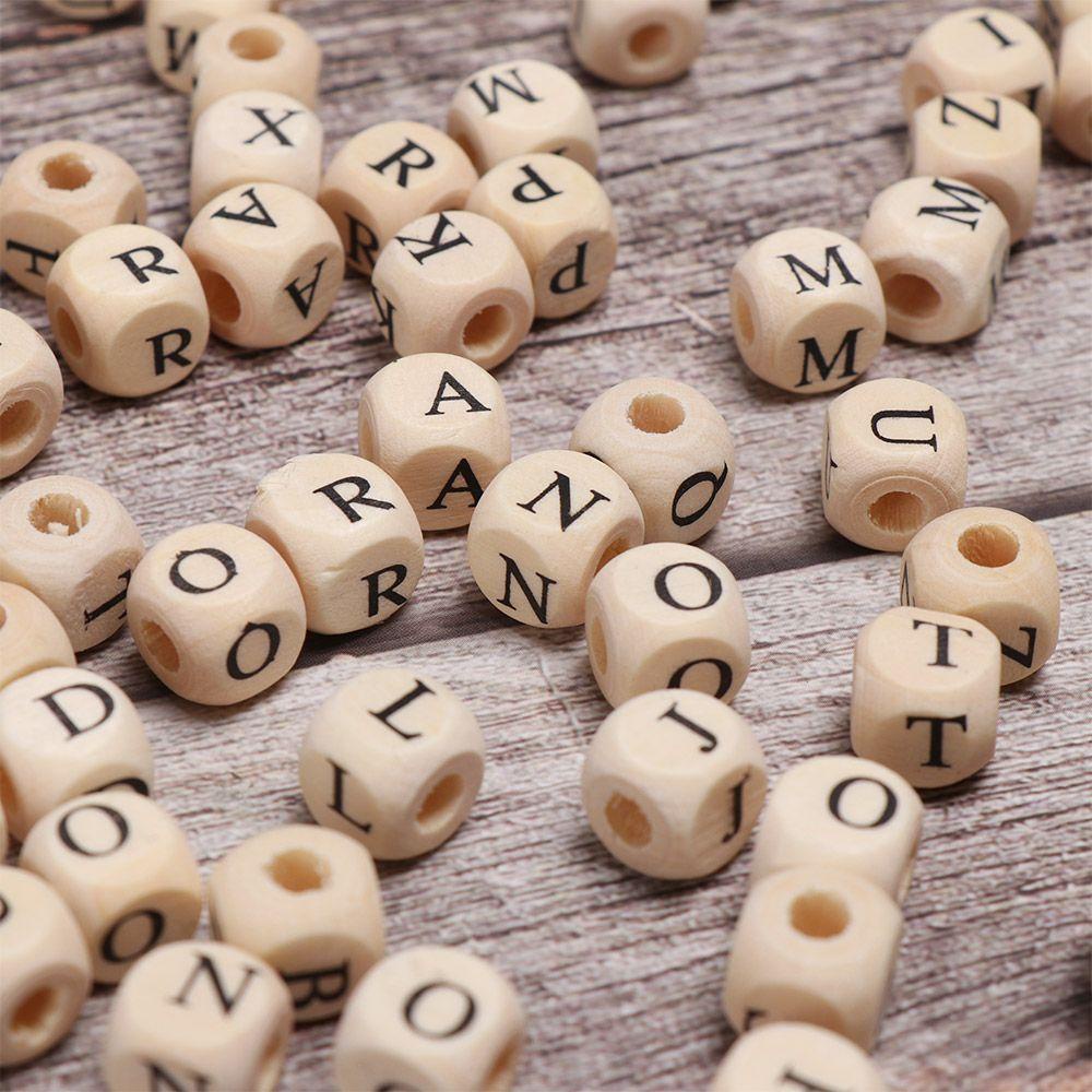 Set 100 Hạt Xâu Chuỗi Khắc Chữ Cái / Số Làm Vòng Cổ Cho Bé Mọc Răng DIY