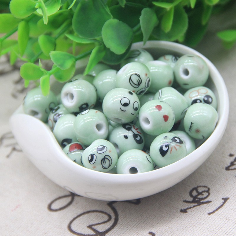 Túi 10 Hạt Sứ Xâu Chuỗi 14mm Hình Mặt Cười Dùng Làm Trang Sức Thủ Công
