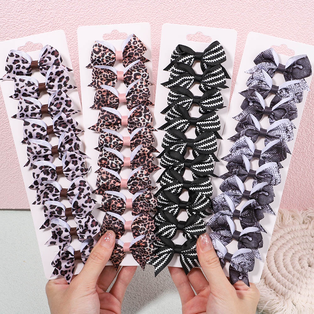 Set 10 kẹp tóc KIDSBOWS đính nơ họa tiết da báo cho bé gái