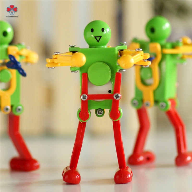 MỚI Robot đồ chơi lên dây cót nhảy múa bằng nhựa thumbnail