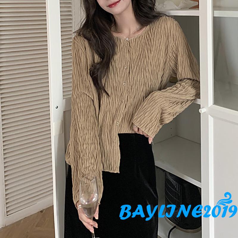 Áo kiểu tay dài cổ chữ V cài nút màu trơn dáng rộng màu be/kaki cho nữ