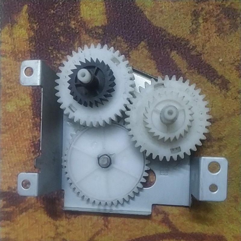 Cụm nhông đảo mặt máy in canon LBP 3300