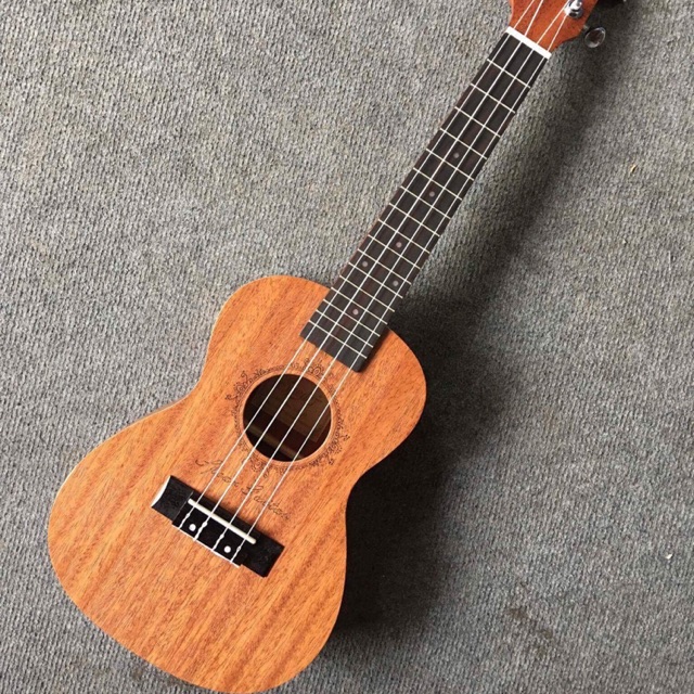 GUITAR GỖ ĐẬM KHẮC HOA