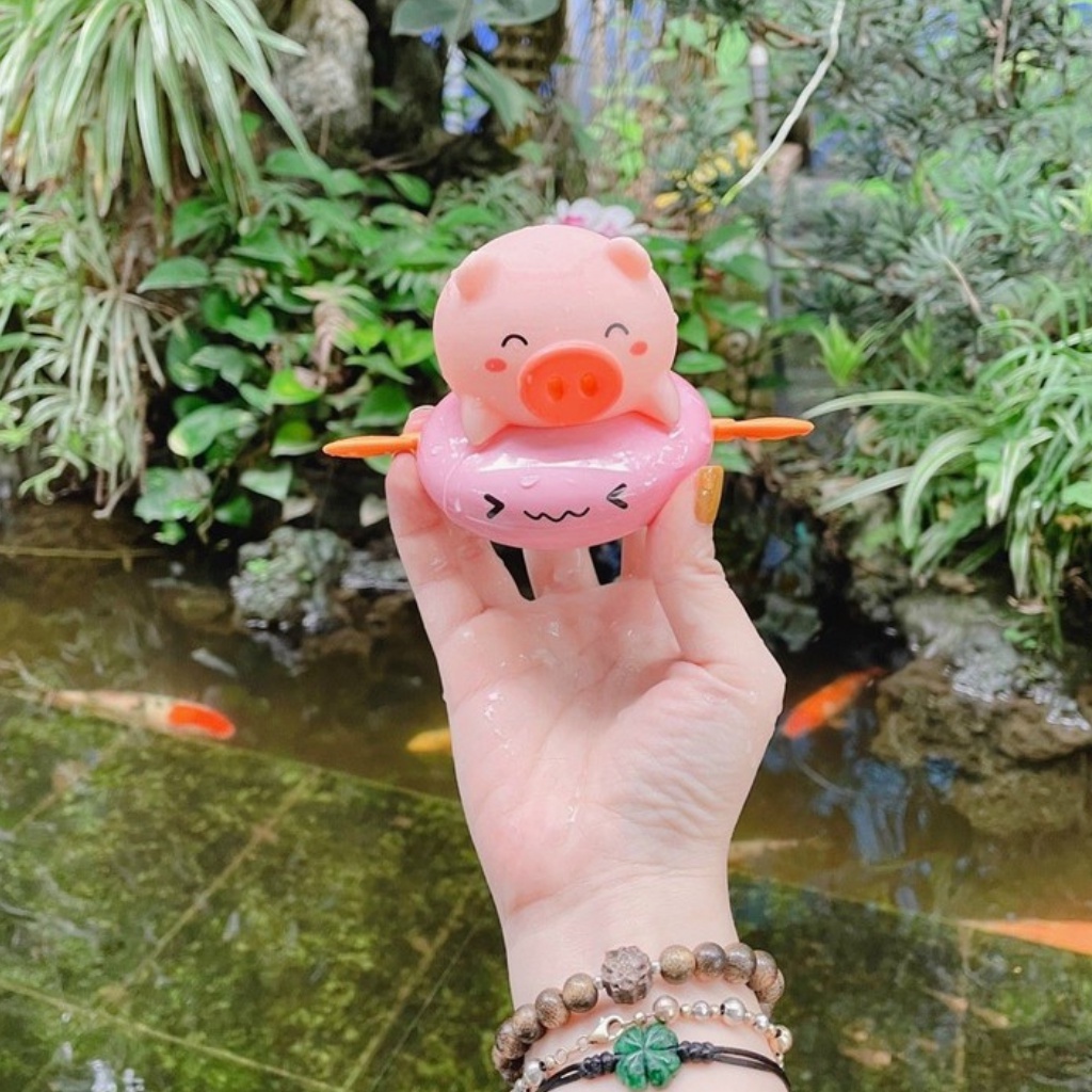 Đồ chơi nhà tắm cho bé, dạng THÚ BƠI BÒ, HEO PHUN NƯỚC CHÈO THUYỀN THẢ BỒN TẮM CHO BÉ