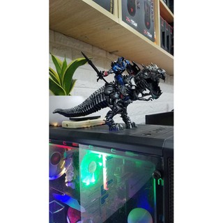 MÔ HÌNH OPTIMUS PRIME CƯỠI KHỦNG LONG TRANSFORMERS