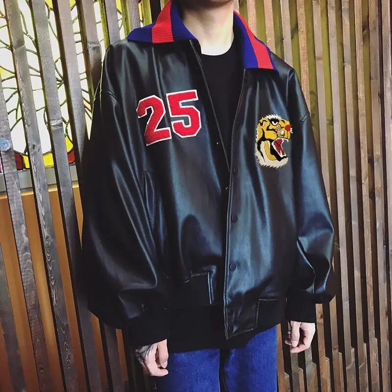 Áo da thêu thủ công