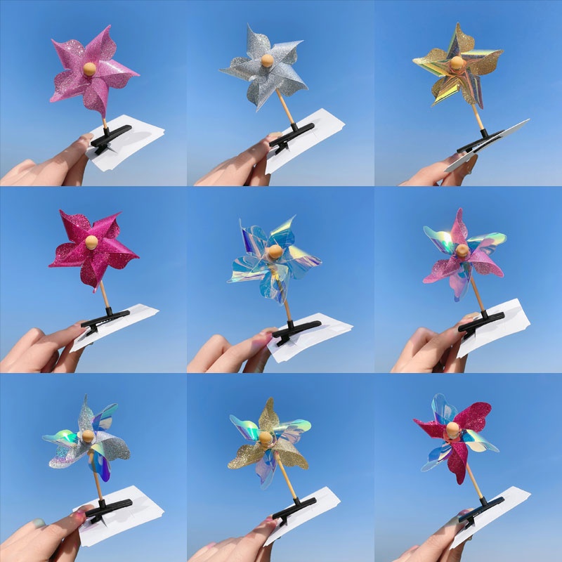 Kẹp tóc bé gái thiết kế chong chóng dễ thương có thể xoay vòng