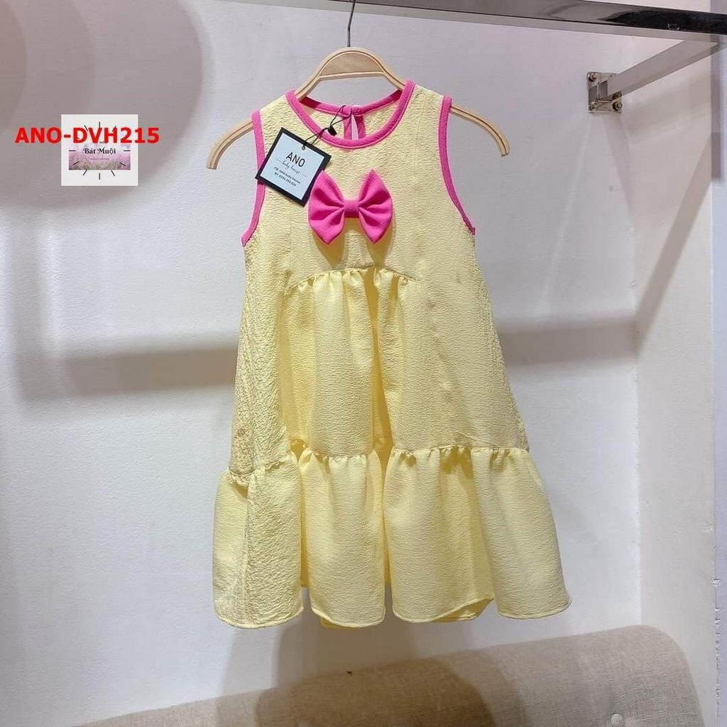 Đầm chữ A vàng đính nơ hồng Ano Baby House