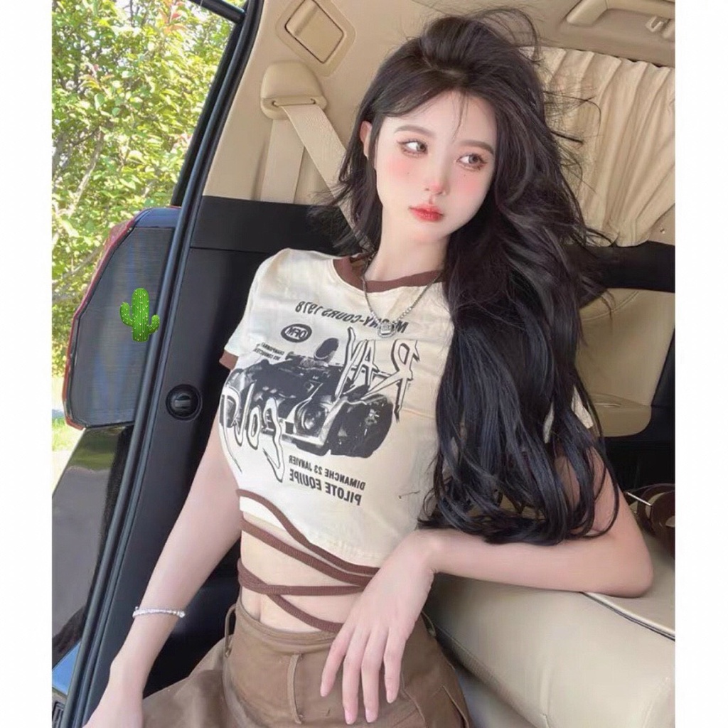 Áo kiểu croptop in họa tiết trước phối viền màu nâu và dây quần eo cực xinh , chất thun mềm mát