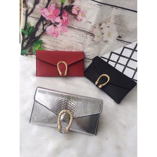 Ví clutch đầu rồng