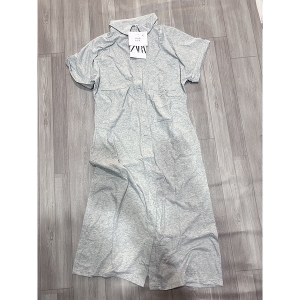 VÁY COTTON RÚM MÀU GHI TÚI NGỰC