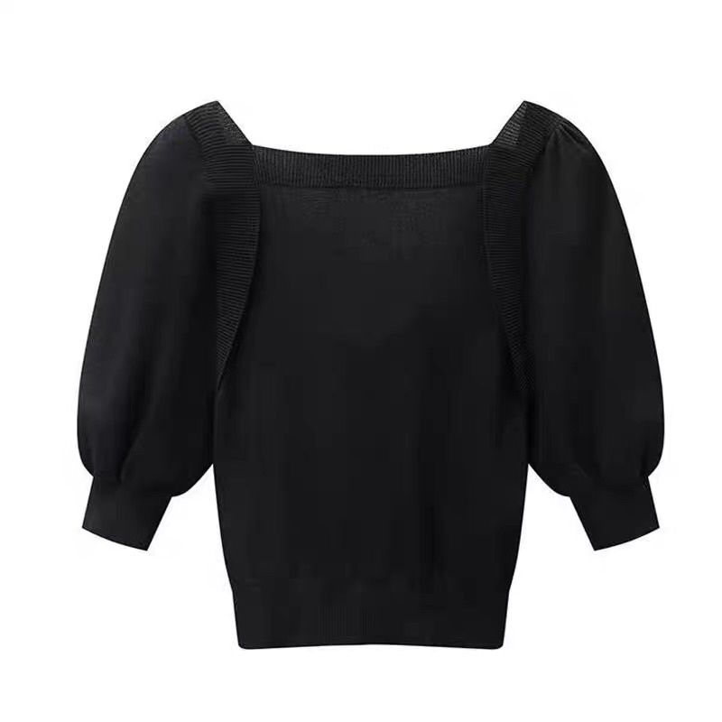 Áo len đen phối nơ trắng Peacebird