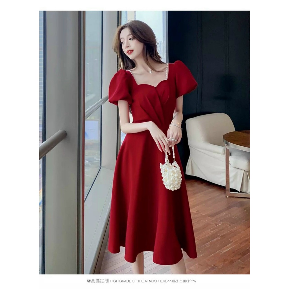 Đầm xòe tay phồng kết cườm xếp ly ngực xinh xắn