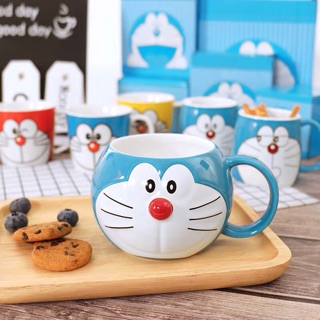 (CỐC MÈO MÁY DOẢEMON (có sẵn cốc mèo nắp)