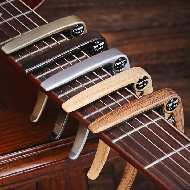 Capo guitar màu gỗ Leson