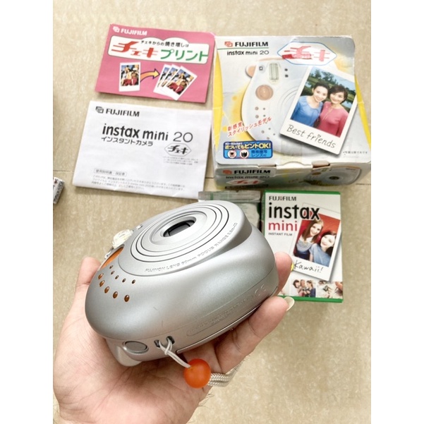 Máy chụp ảnh lấy liền Fujifilm Instax Mini 20 Cheki , tặng hộp film 10 tấm, tặng Pin CR2, tặng dây đeo