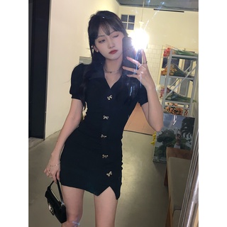 Váy ôm đen đính nơ nổi