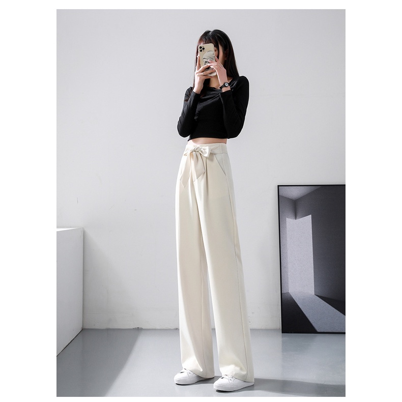 Quần ống rộng nơ bản to cách điệu