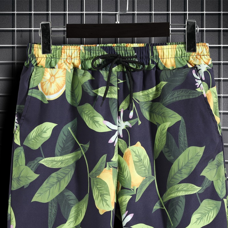 Quần short đi biển hoạ tiết lá xanh cho nam và nữ size M-5XL