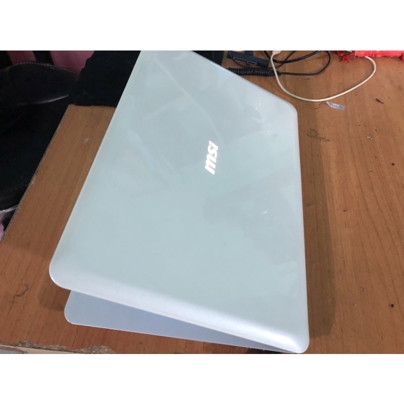 Laptop MSI Slim x340 Celeron 723 Ram 2G ssd 120G 13.4inch