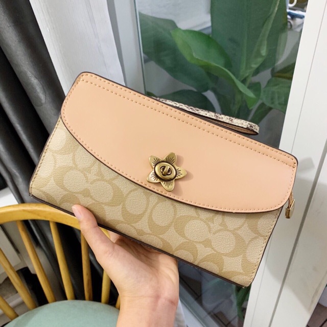 Ví coach cầm tay