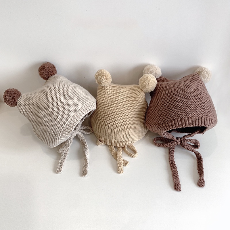 Mũ beanie dệt kim đính hai quả bông hoạt hình giữ ấm vào mùa đông đáng yêu cho bé