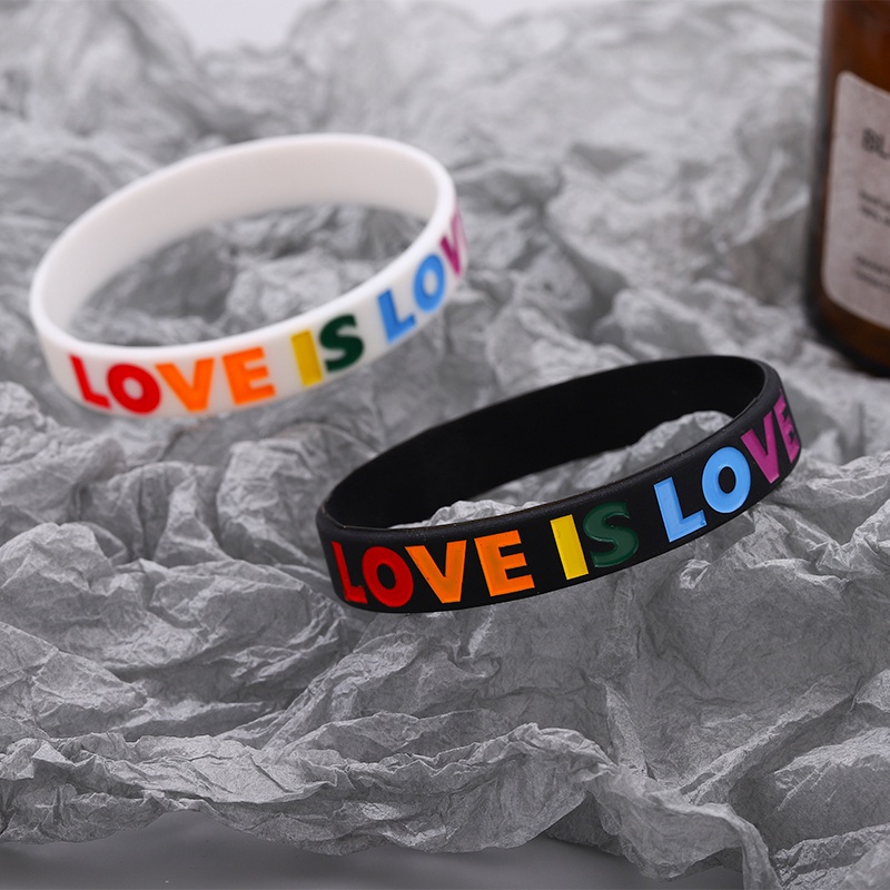 Vòng Tay Cặp Đôi Bằng Cao Su Mềm Màu Trắng Đen Chữ LOVE IS LOVE