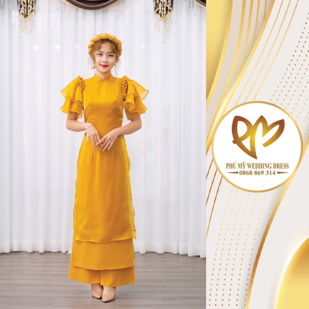 Áo dài von tơ tay cánh tiên vàng điệu đà cho nàng