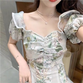 Jumpsuit trễ vai xanh