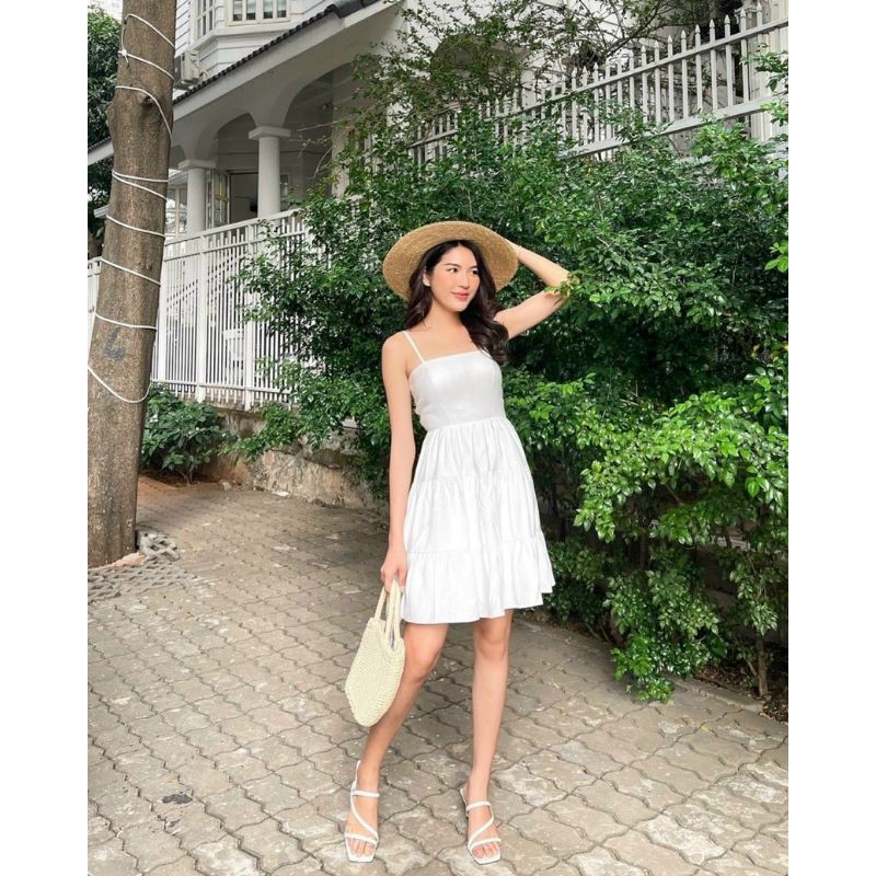 Đầm trắng dây baby doll đan dây sau.