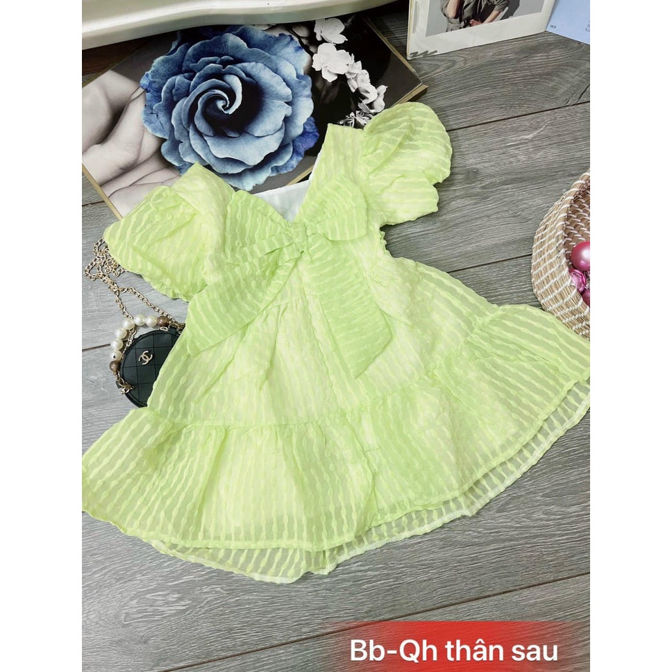 Đầm tay bồng màu xanh cốm nơ sau lưng cho bé gái