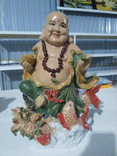 TƯỢNG DI LẶC ĐỨNG TRÊN CÁ RỒNG