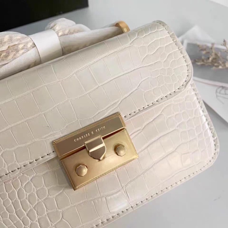 Túi xách Cnk mini vân rắn hàng Đẹp loại 1 đeo chéo size 18