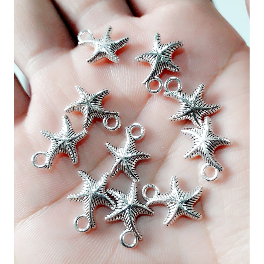 Sỉ charm bạc cổ chất liệu Hợp Kim handmade : 50g = 25k / 1 gói