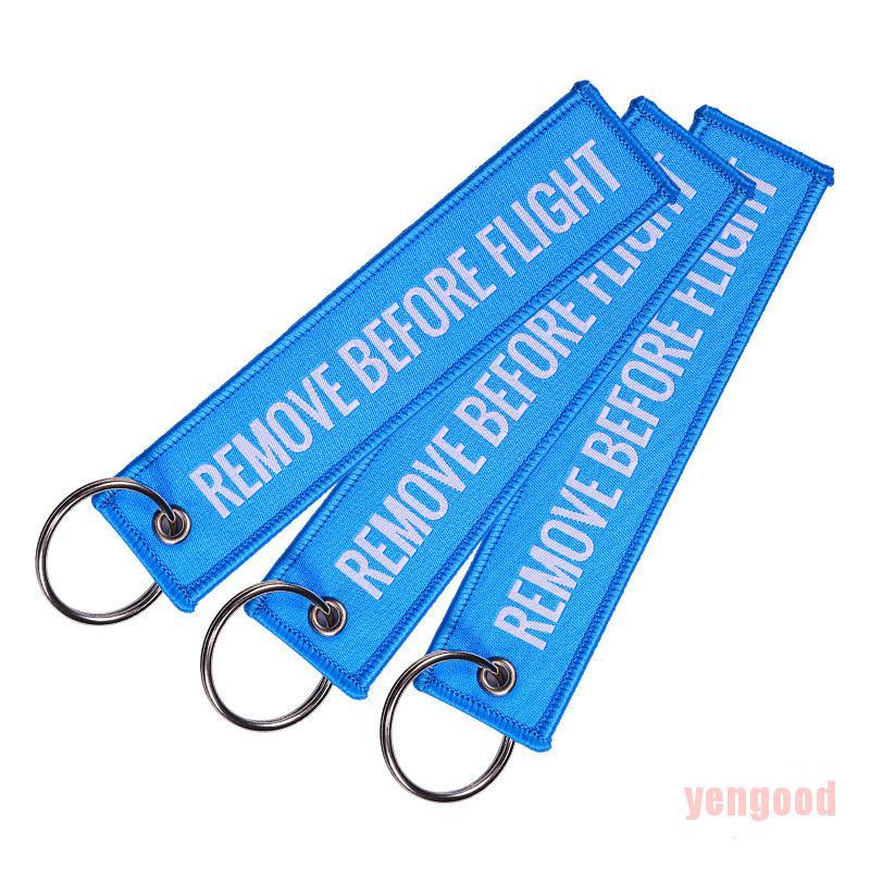 Móc khóa thêu chữ REMOVE BEFORE FLIGHT nhiều màu tùy chọn