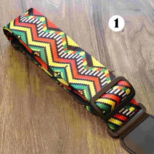 Dây đeo đàn guitar siêu dày và đàn bốn dây