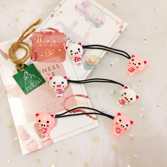 CỘT TÓC BÉ HEO ĐÁNG YÊU ẢNH THẬT