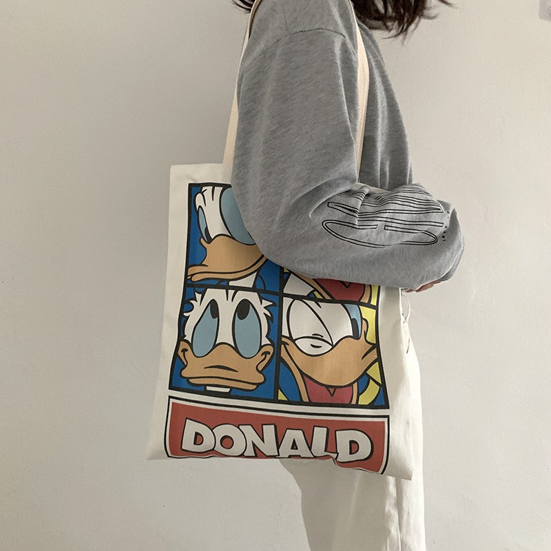 Túi vải đeo vai in hình vịt Donald dễ thương cho nữ