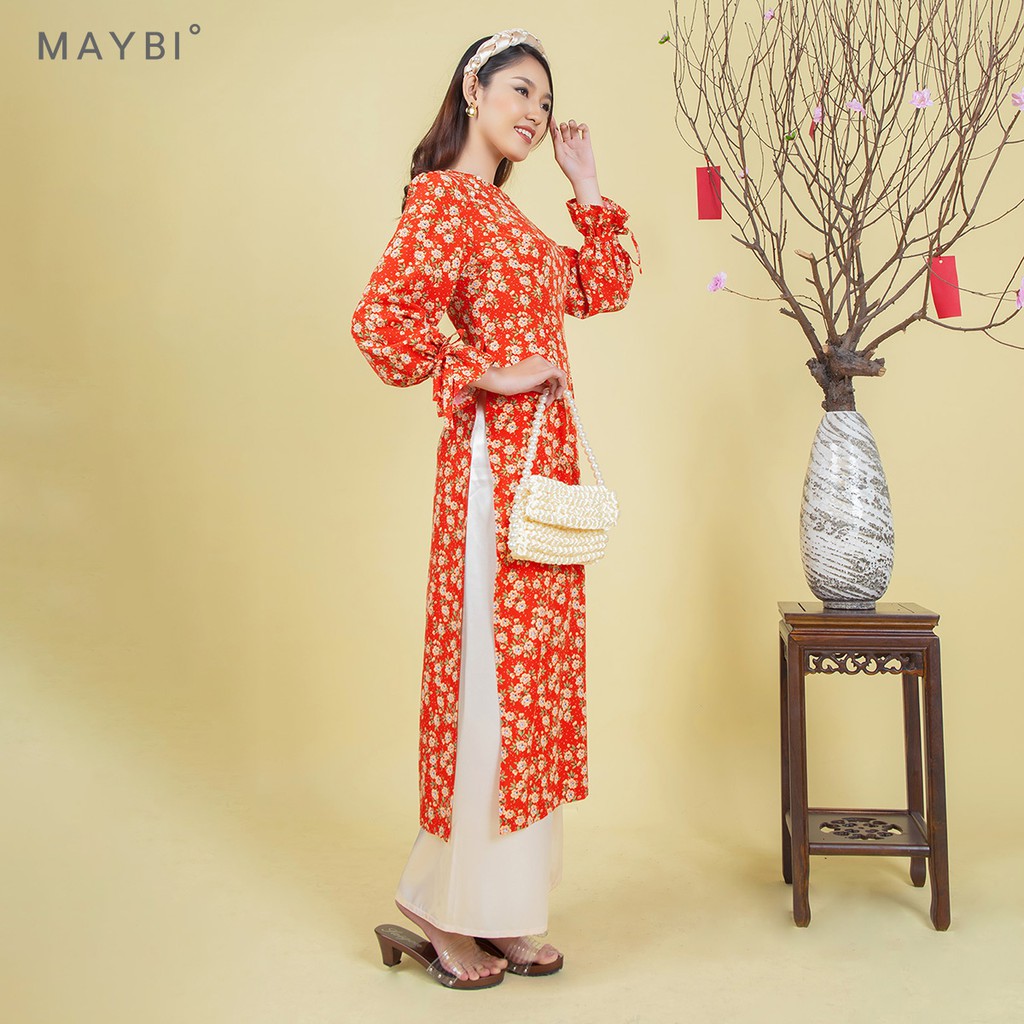 Áo dài Maybi hoạ tiết hoa nền đỏ tay phồng dài phối nơ