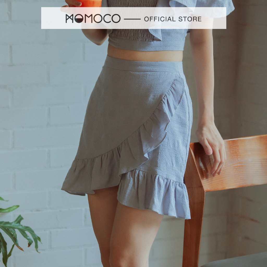 Chân Váy Mini Xòe MOMOCO Vạt Chéo Gấu Bèo Kiểu Dáng Trẻ Trung M2393