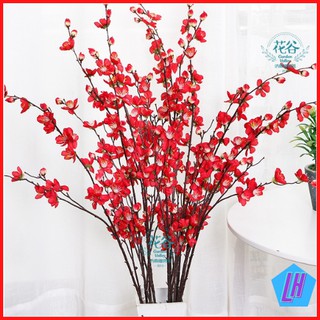 Cành mai- hoa giả treo tường để bàn trang trí không gian phòng khách ngày tết đẹp