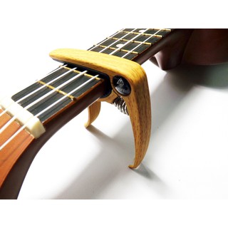Capo kẹp đàn vân gỗ sáng