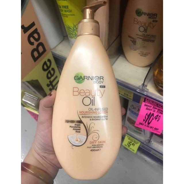 Dầu dưỡng thể Garnier Body Oil Beauty Extra Dry Skin Restoring Lotion 250ml Ouibeaute | BigBuy360 - bigbuy360.vn