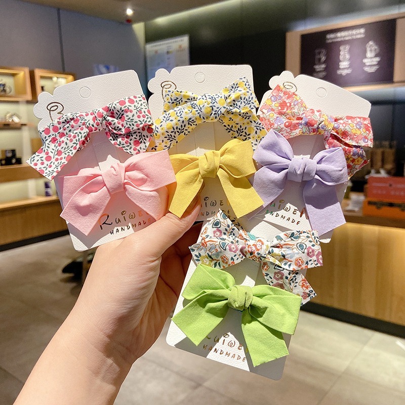 Set 2 kẹp tóc hình nơ xinh xắn phong cách Hàn Quốc dành cho bé gái