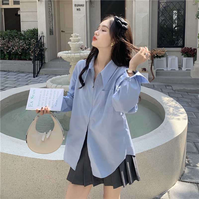 Áo sơ mi trắng tay dài cổ polo dáng rộng có khóa kéo đôi phong cách retro Mỹ thời trang cho nữ