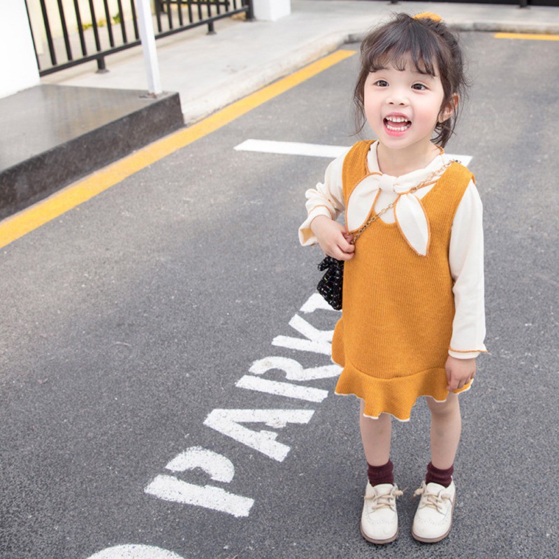 Set áo thun dài tay cổ tròn + chân váy ngắn đính nơ thời trang cho bé gái