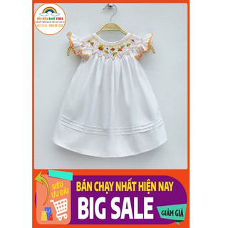 Đầm smock cánh tiên trắng viền cam