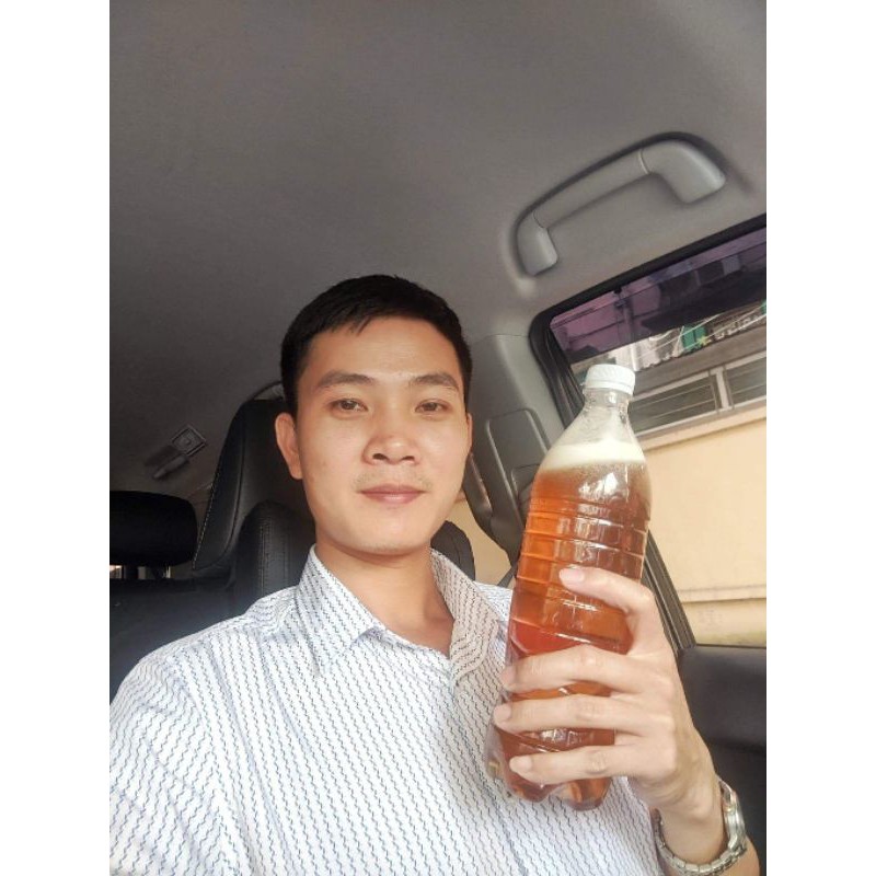 Mật ong rừng Ong Khoái Tây Bắc chai 1lít - Không ngon shop hoàn lại tiền.